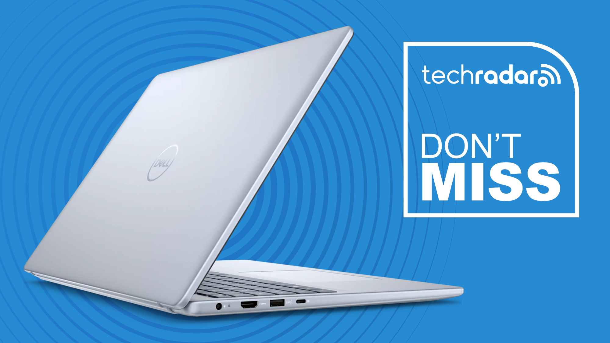 Ordinateur portable Dell Inspiron 16 légèrement ouvert et affichant le logo Dell